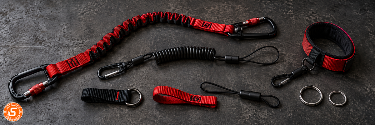 Illustration von Werkzeugsicherungsleinen und Befestigungszubehör zum Milwaukee-Lanyard-Ratgeber von Unishore Workwear.